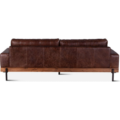 Chiavari Industrial Vintage Dark Brown Leather Sofa by World Interiors in geisha brown, antique zinc, medium walnut. Made from leather, foam, oak wood & iron in a transitional style.