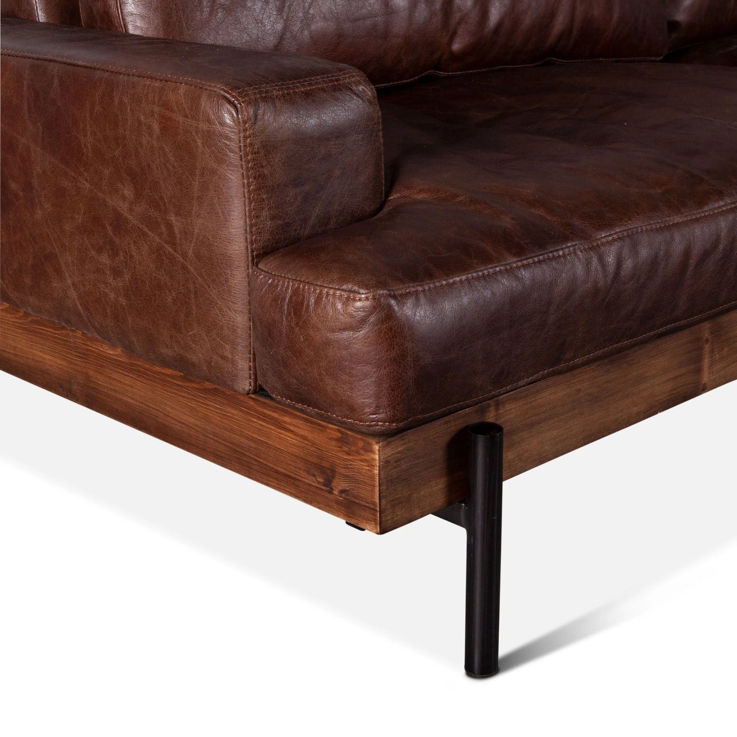005 SI-2065539 | Closeup | Chiavari Industrial Vintage Dark Brown Leather Sofa by World Interiors in geisha brown, antique zinc, medium walnut. Made from leather, foam, oak wood & iron in a transitional style.