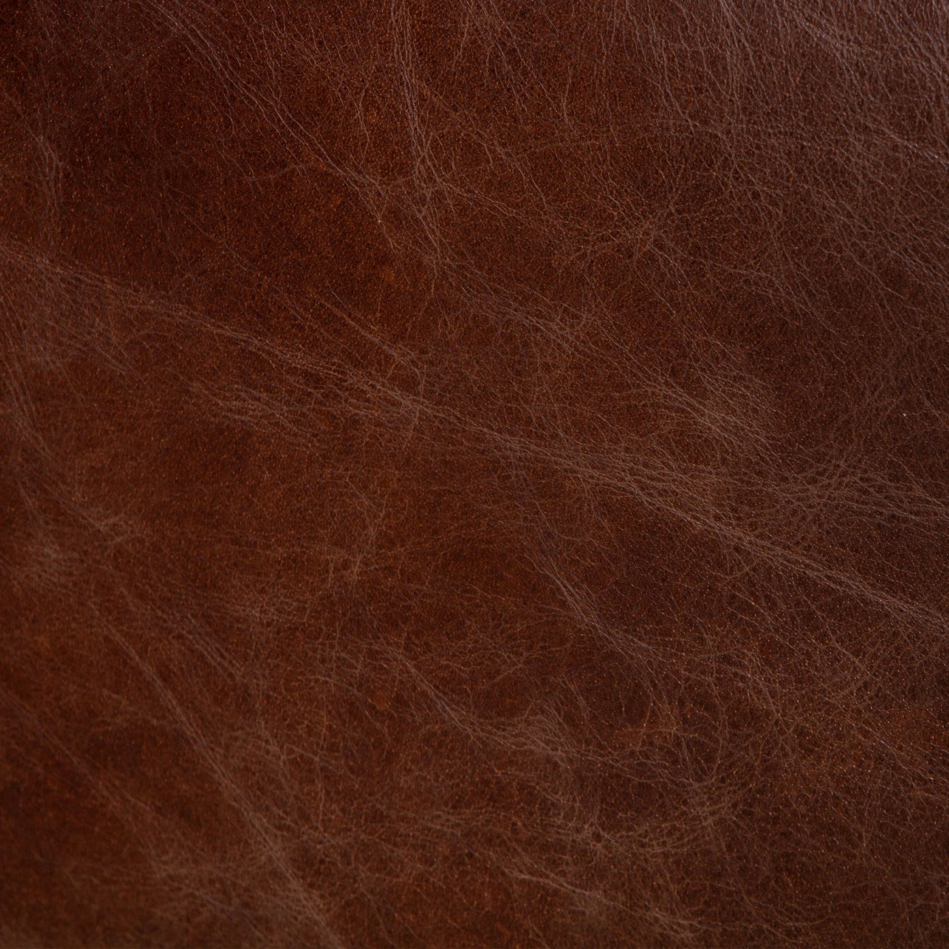 Chiavari Industrial Vintage Dark Brown Leather Sofa by World Interiors in geisha brown, antique zinc, medium walnut. Made from leather, foam, oak wood & iron in a transitional style.