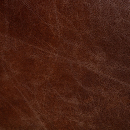 Chiavari Industrial Vintage Dark Brown Leather Sofa by World Interiors in geisha brown, antique zinc, medium walnut. Made from leather, foam, oak wood & iron in a transitional style.