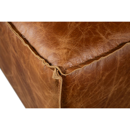 Chiavari Ottoman by World Interiors in brown and coco brown. Made from leather, foam, wood in a traditional style.