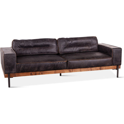 Chiavari Antique Leather Sofa by World Interiors in black and matte. Made from leather, foam, oak wood, iron in a modern style.
