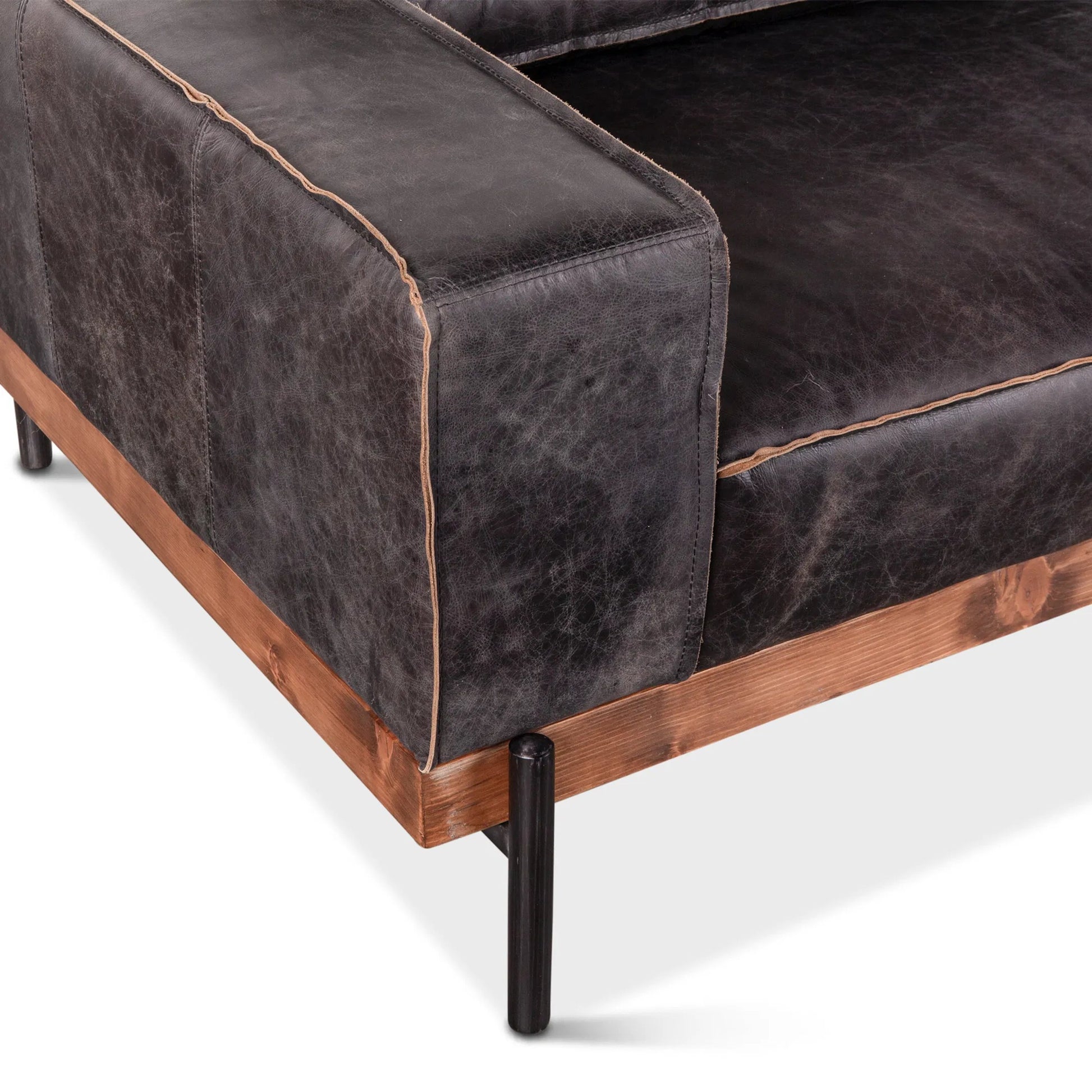 Chiavari Antique Leather Sofa by World Interiors in black and matte. Made from leather, foam, oak wood, iron in a modern style.