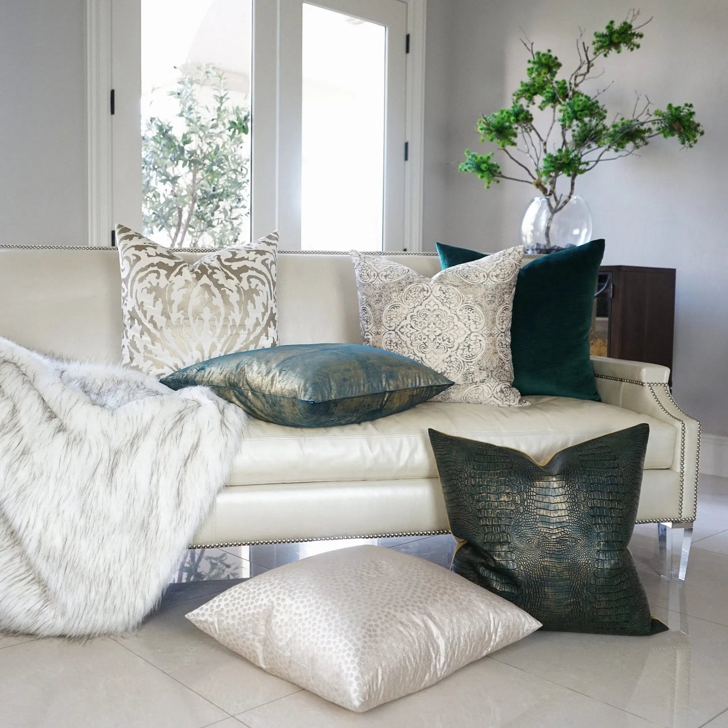 003 SI-2381298 | Lifestyle | Hepburn Pillow by DV Kap Home. Made from 65% polyester, 35% metallic in a transitional style.