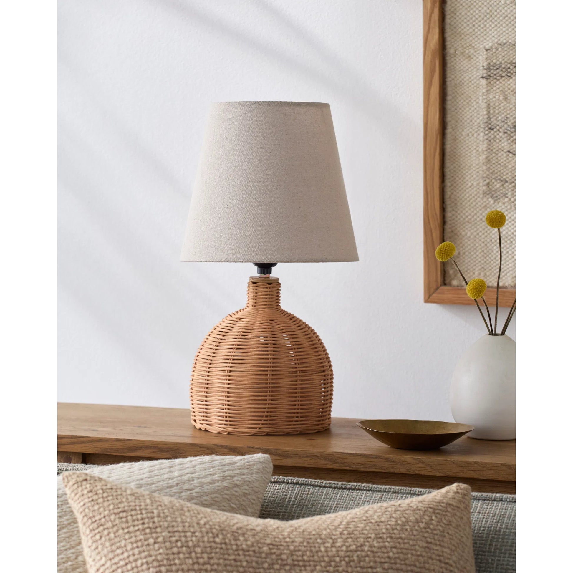 Grotta Accent Table Lamp by Surya in painted. Made from rattan, linen, plastic in a rustic style.