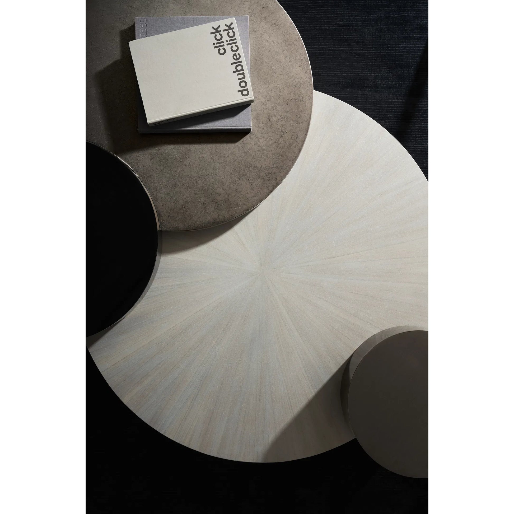 Constellation Cocktail Table by Caracole in black and silver burst, piano black, twilight frost, brushed tungsten. Made from birch, metal in a modern style.