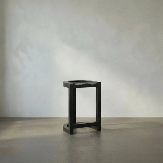 Saddle Counter Stool by Noir in hand rubbed black. Made from mahogany in a modern style.