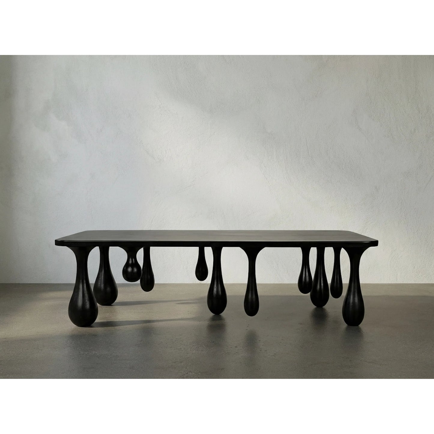 021 SR-834008 | Lifestyle | Drop Coffee Table by Noir in hand rubbed black. Made from mahogany in a modern style.