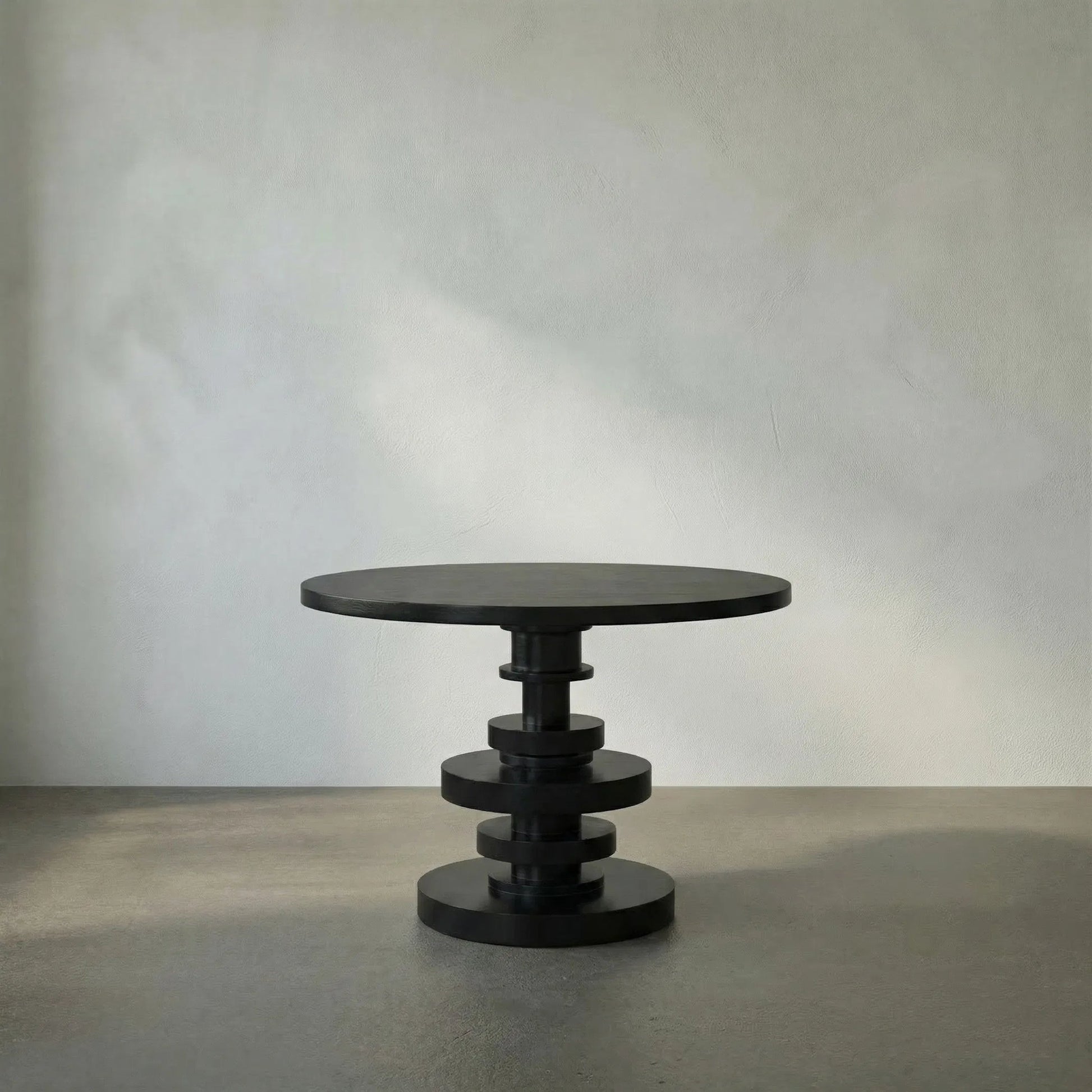 Corum Round Table by Noir in hand rubbed black. Made from mahogany in a modern style.