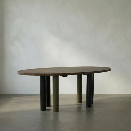 Journal Oval Dining Table by Noir in dark walnut, matte black, aged brass. Made from walnut and industrial steel in a modern style.