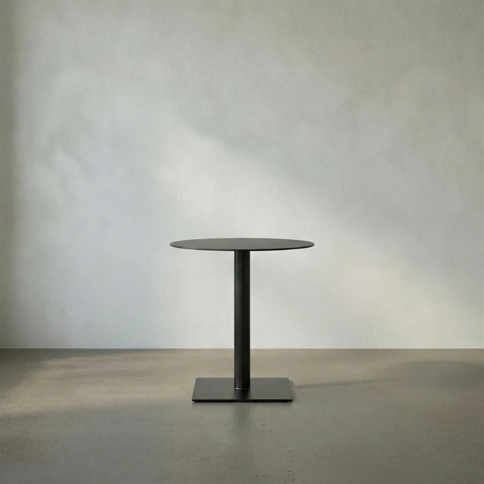 Mies Side Table by Noir in cast iron. Made from cast iron in a modern style.