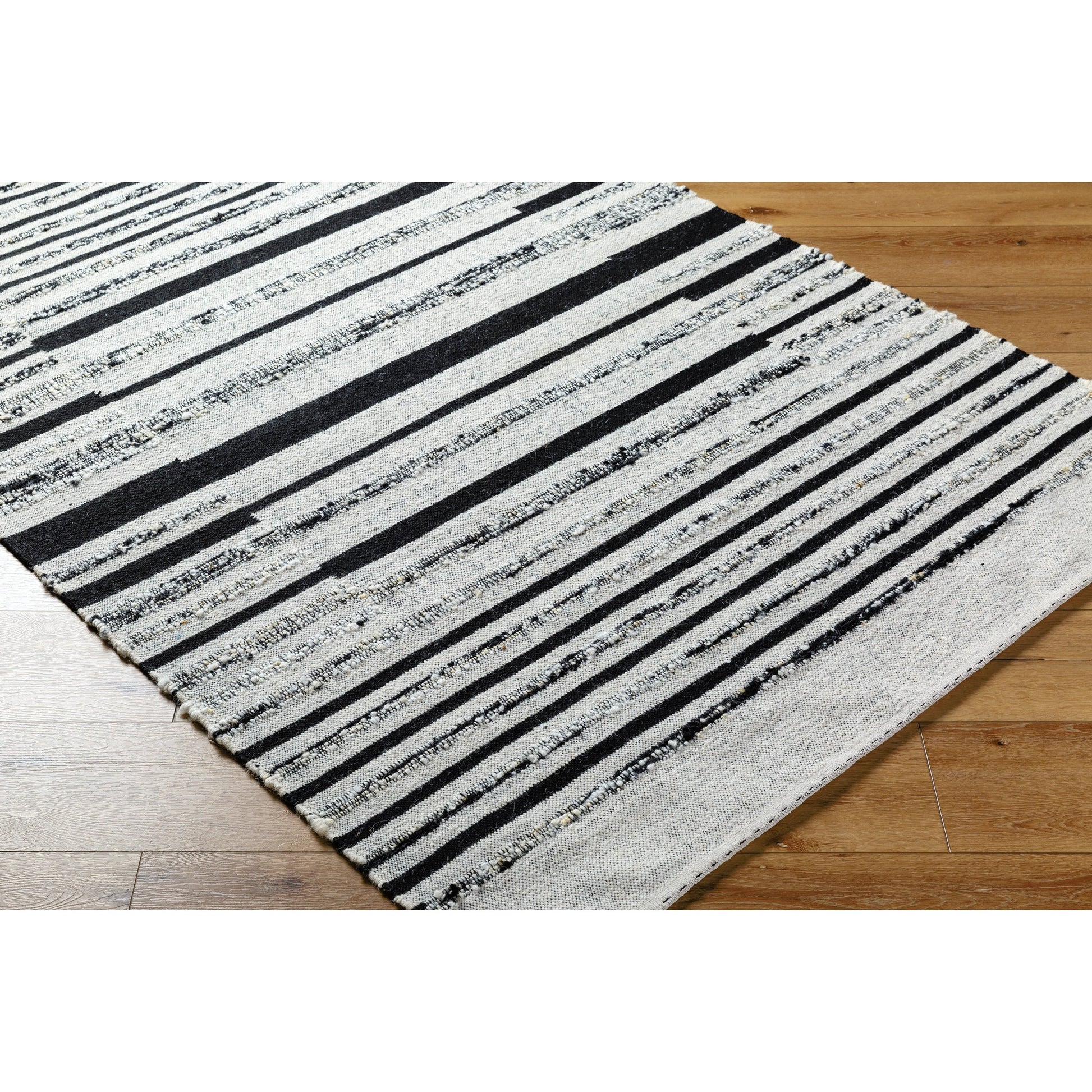 Goteborg GTG-2300 Rug by Surya in ivory, black. Made from face: 80% wool, 20% cotton, warp: 20% cotton in a unique style.