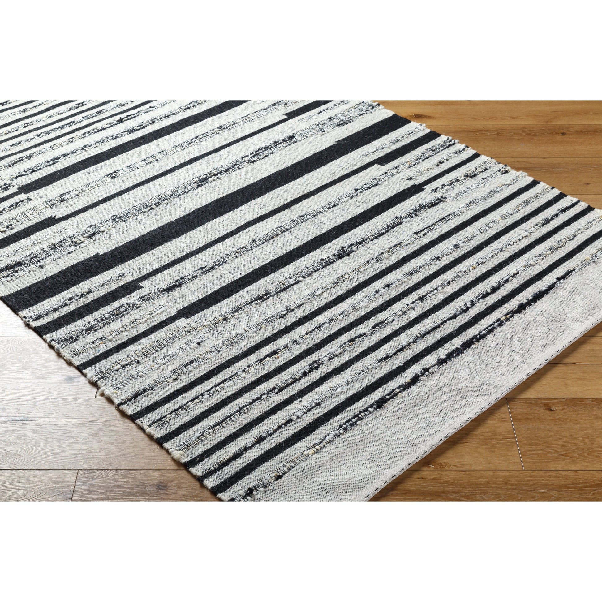 Goteborg GTG-2300 Rug by Surya in ivory, black. Made from face: 80% wool, 20% cotton, warp: 20% cotton in a unique style.