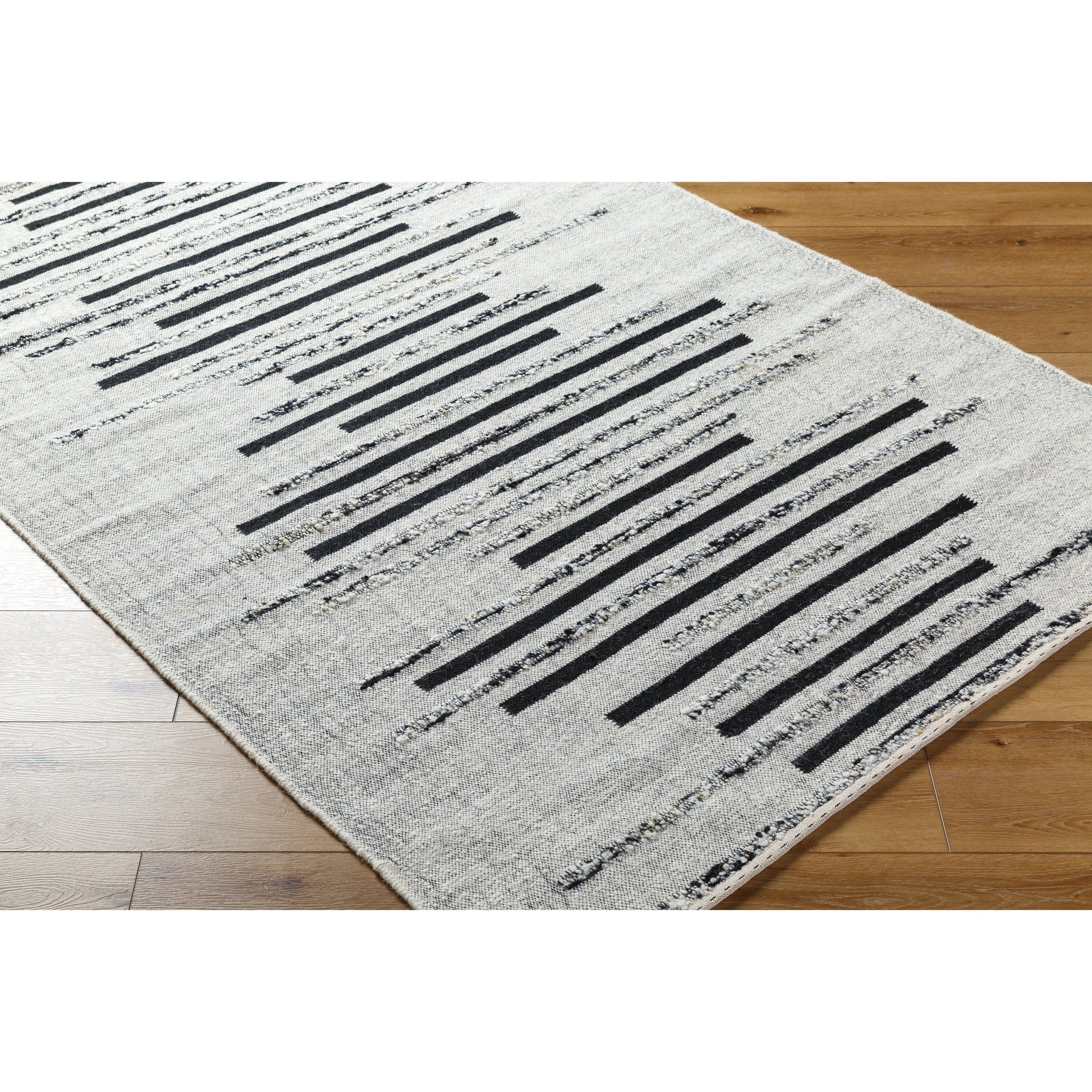 Goteborg GTG-2301 Rug by Surya in ivory, black. Made from face: 80% wool, 20% cotton, warp: 20% cotton in a unique style.