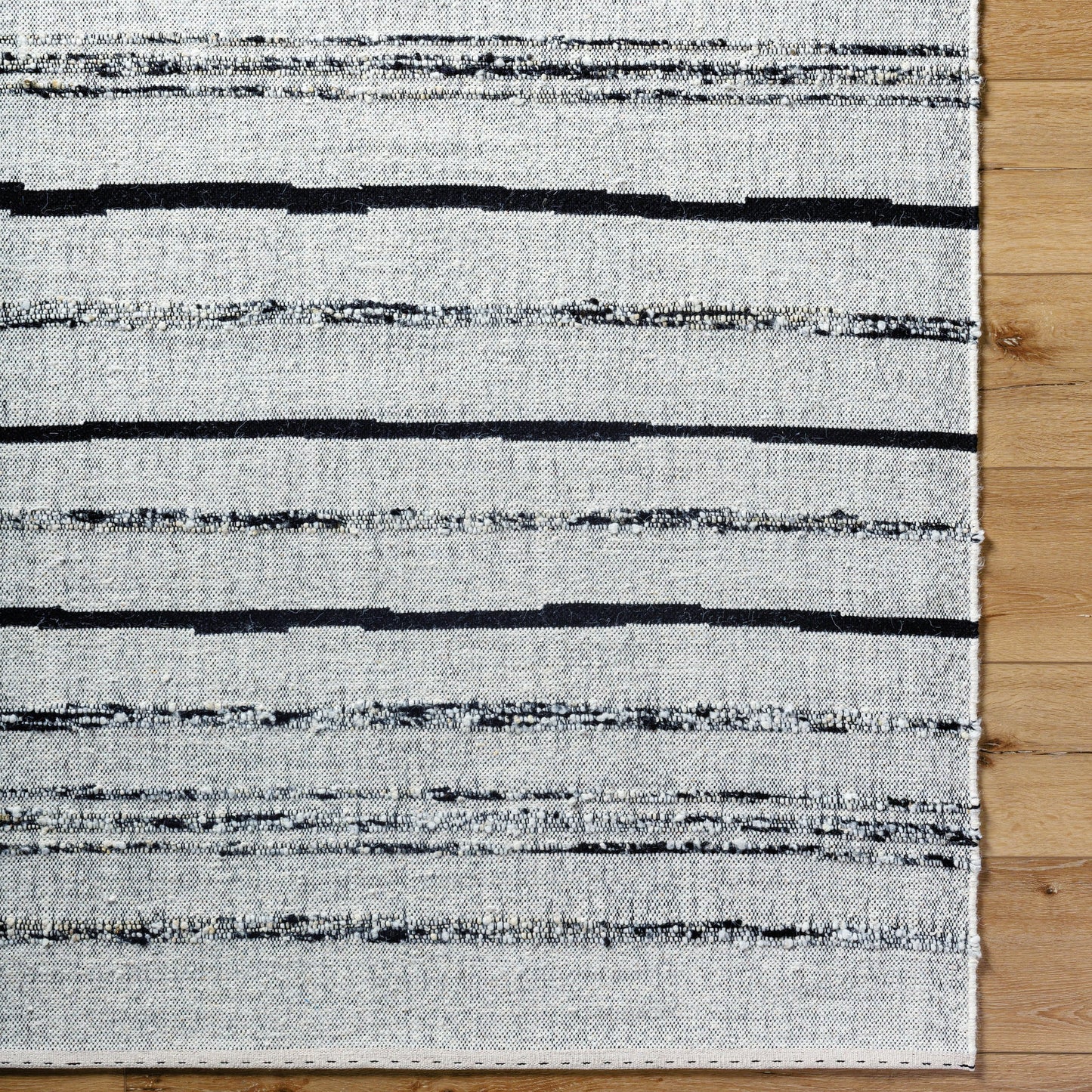 005 SI-2131753,SI-2131754,SI-2131755,SI-2131756 | Closeup | Goteborg GTG-2302 Rug by Surya in ivory, black. Made from face: 80% wool, 20% cotton, warp: 20% cotton in a unique style.