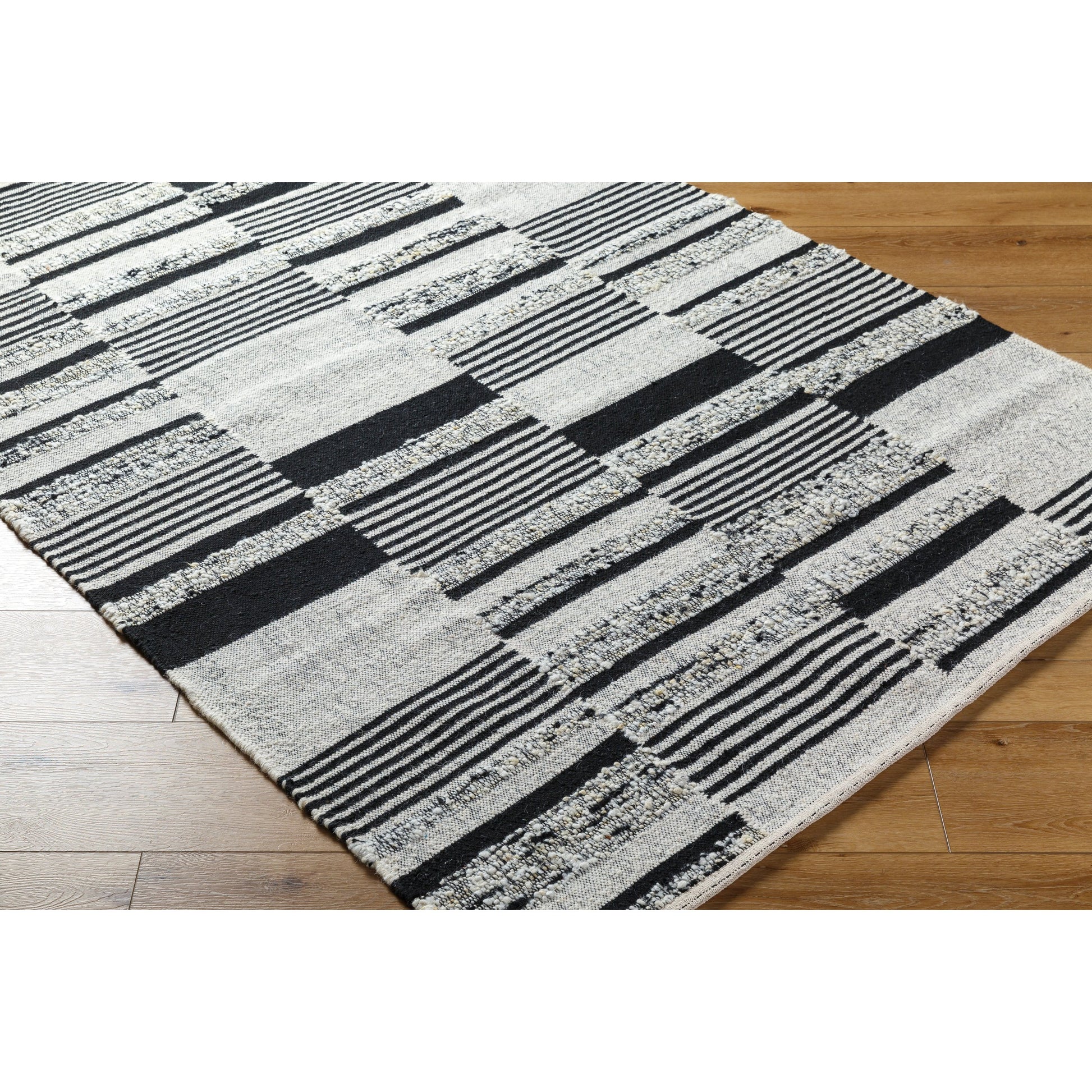 Goteborg GTG-2303 Rug by Surya in ivory, black. Made from face: 80% wool, 20% cotton, warp: 20% cotton in a unique style.