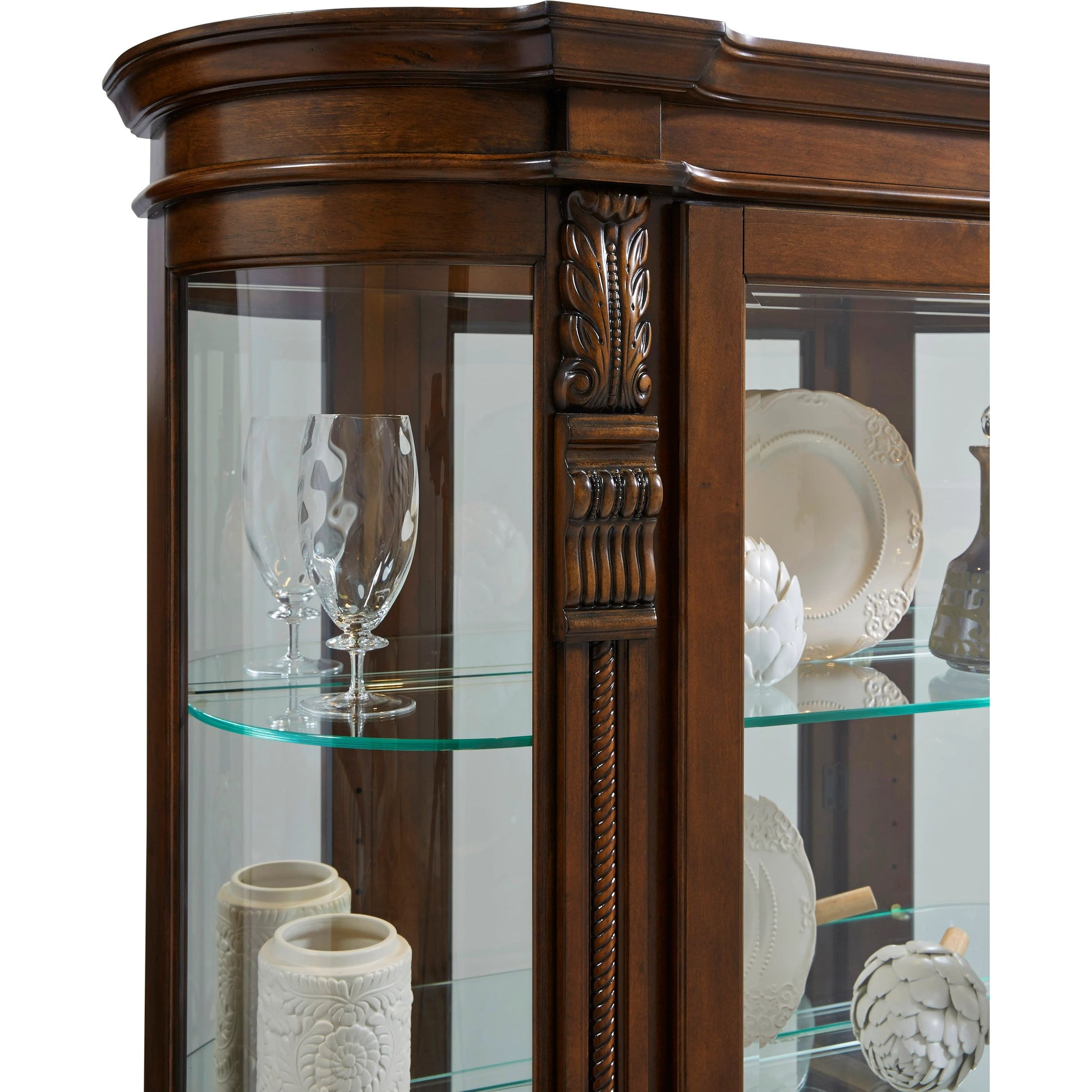 Curved End Curio by Pulaski Furniture in warm maple brown. Made from select hardwood solids, veneers in a traditional style.