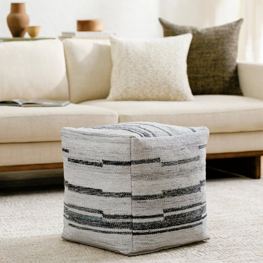 Guinea - 484017 by Surya in off-white, silver, light silver, pewter, onyx. Made from top: 100% recycled pet yarn, bottom: 100% polyester, fill: 100% polybeads in a modern style.