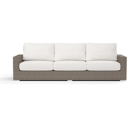 Coronado Outdoor Sofa in Canvas Flax by Sunset West in driftwood. Made from resin wicker in a modern style.