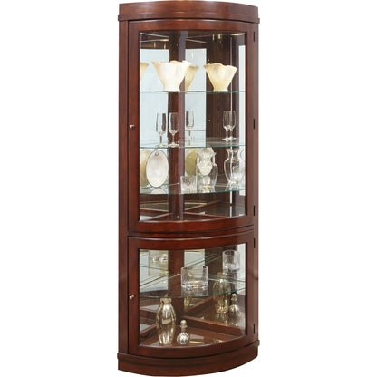 Chocolate Cherry Corner Curio by Pulaski Furniture in chocolate cherry. Made from select hardwood solids, veneers in a traditional style.
