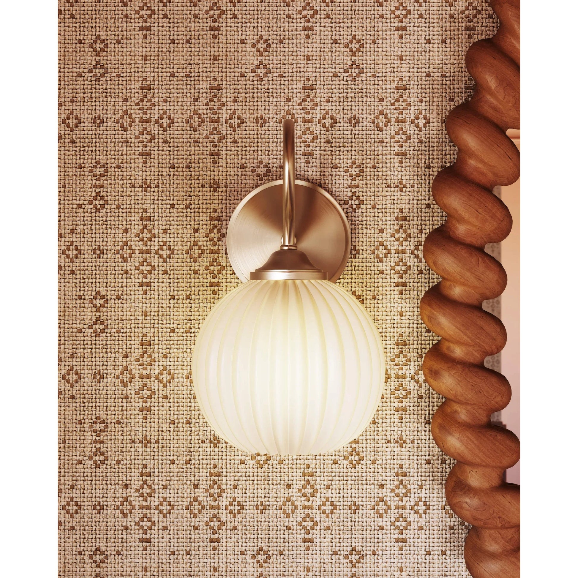 Vida Wall Sconce by Mitzi in patina brass. Made from unique in a unique style.
