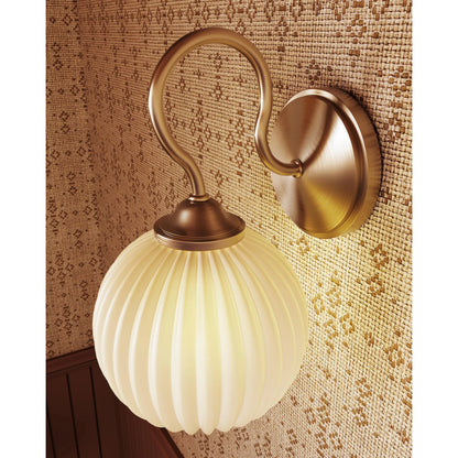Vida Wall Sconce by Mitzi in patina brass. Made from unique in a unique style.