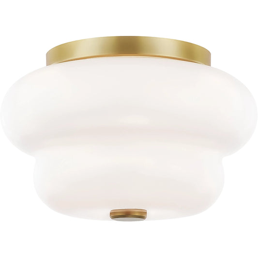 Hazel Flush Mount by Mitzi in aged brass. Made from steel in a transitional style.