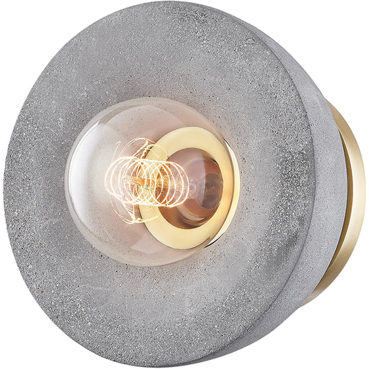 Poppy Flush Mount by Mitzi in aged brass. Made from cement in a modern style.