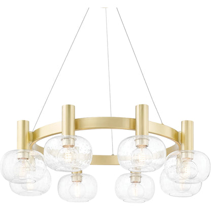 Harlow 8 Light Chandelier by Mitzi in aged brass. Made from steel in a transitional style.