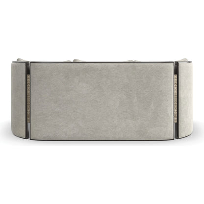 Cut Away Sofa by Caracole in seal skin, brushed gold. Made from birch in a unique style.