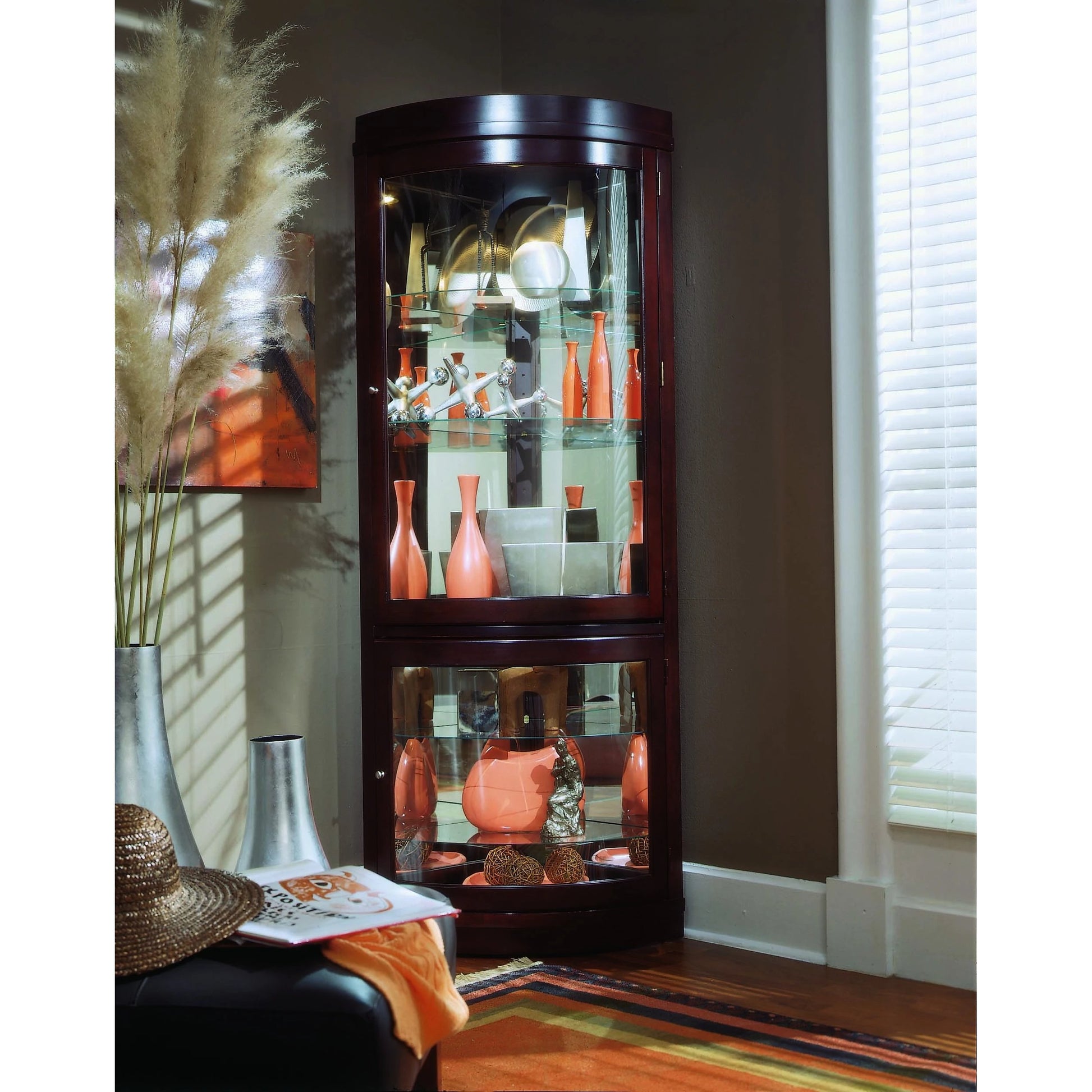 Chocolate Cherry Corner Curio by Pulaski Furniture in chocolate cherry. Made from select hardwood solids, veneers in a traditional style.