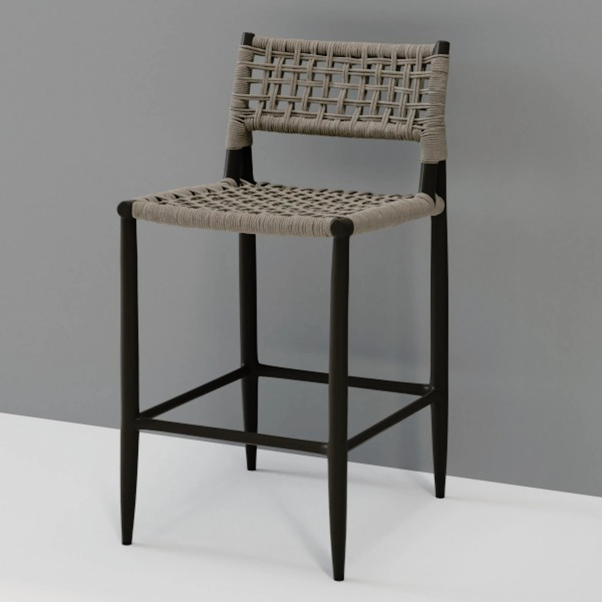 Grigio Outdoor Barstool by Sunset West in graphite. Made from aluminum / olefin rope in a coastal style.