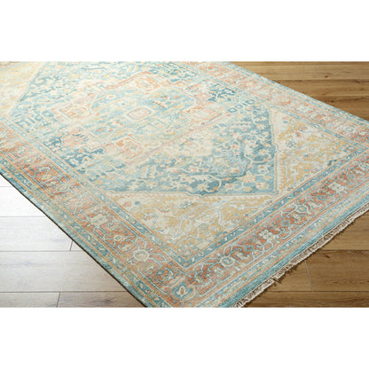 Hamadan Rug by Surya in saffron, camel, light beige, sage, tan. Made from 70% wool, 30% viscose in a traditional style.