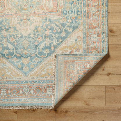 Hamadan Rug by Surya in saffron, camel, light beige, sage, tan. Made from 70% wool, 30% viscose in a traditional style.