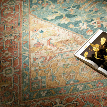 Hamadan Rug by Surya in saffron, camel, light beige, sage, tan. Made from 70% wool, 30% viscose in a traditional style.