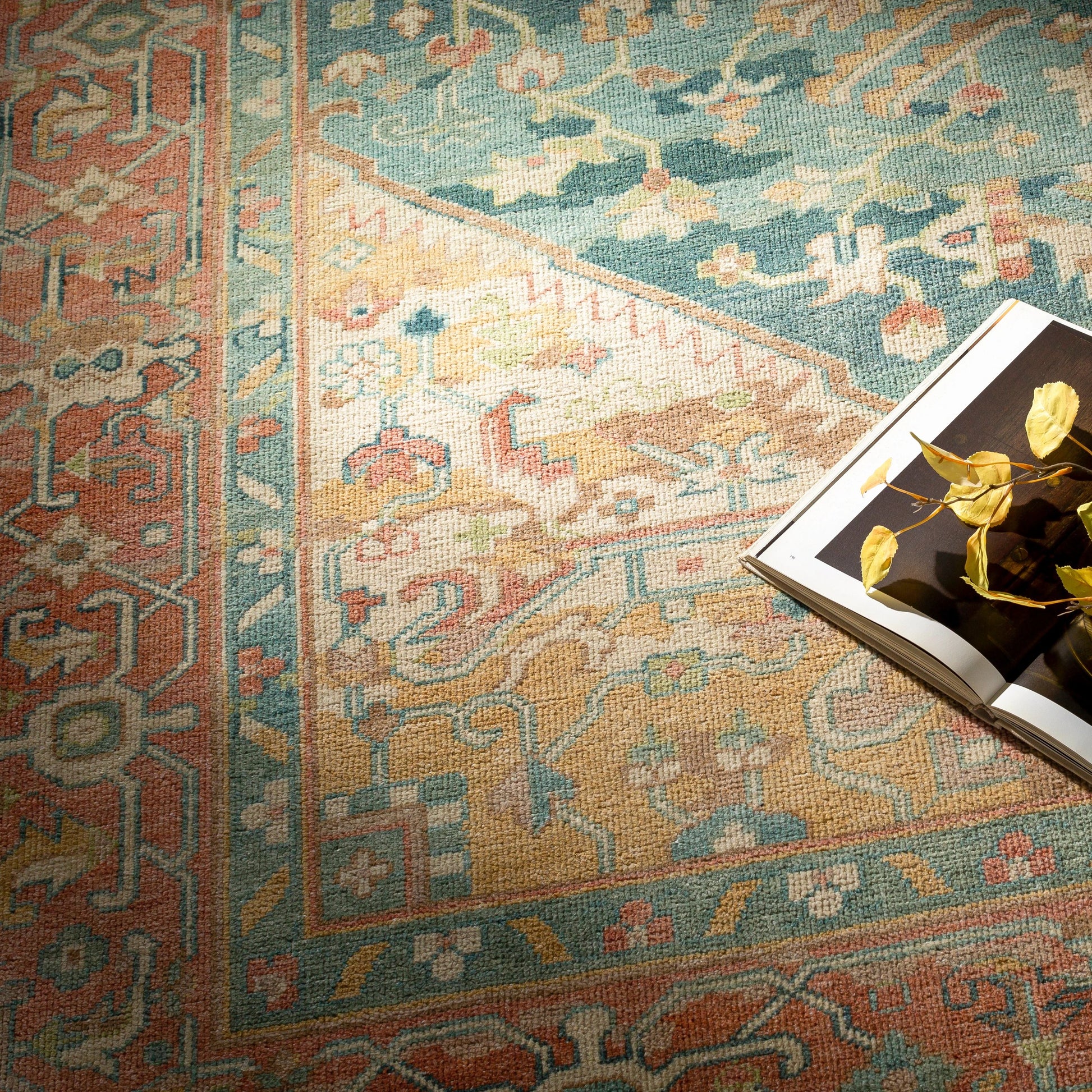 Hamadan Rug by Surya in saffron, camel, light beige, sage, tan. Made from 70% wool, 30% viscose in a traditional style.