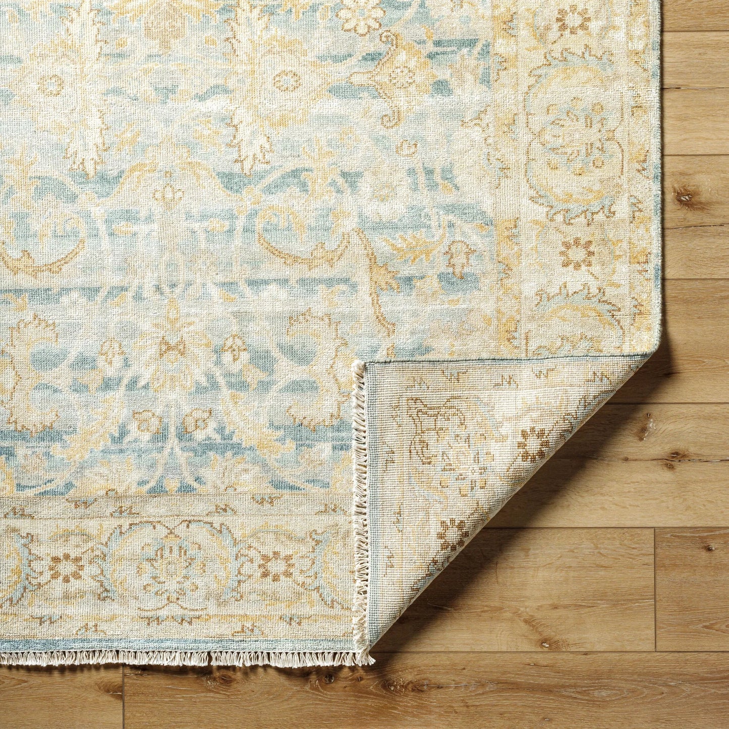 002 SI-1917543,SI-1917544,SI-1917545,SI-1917546,SI-1917547 | Closeup | Hamadan Rug - 31441 by Surya in beige, teal, pale blue, mustard, brown. Made from main: 70% wool, main: 30% viscose in a unique style.