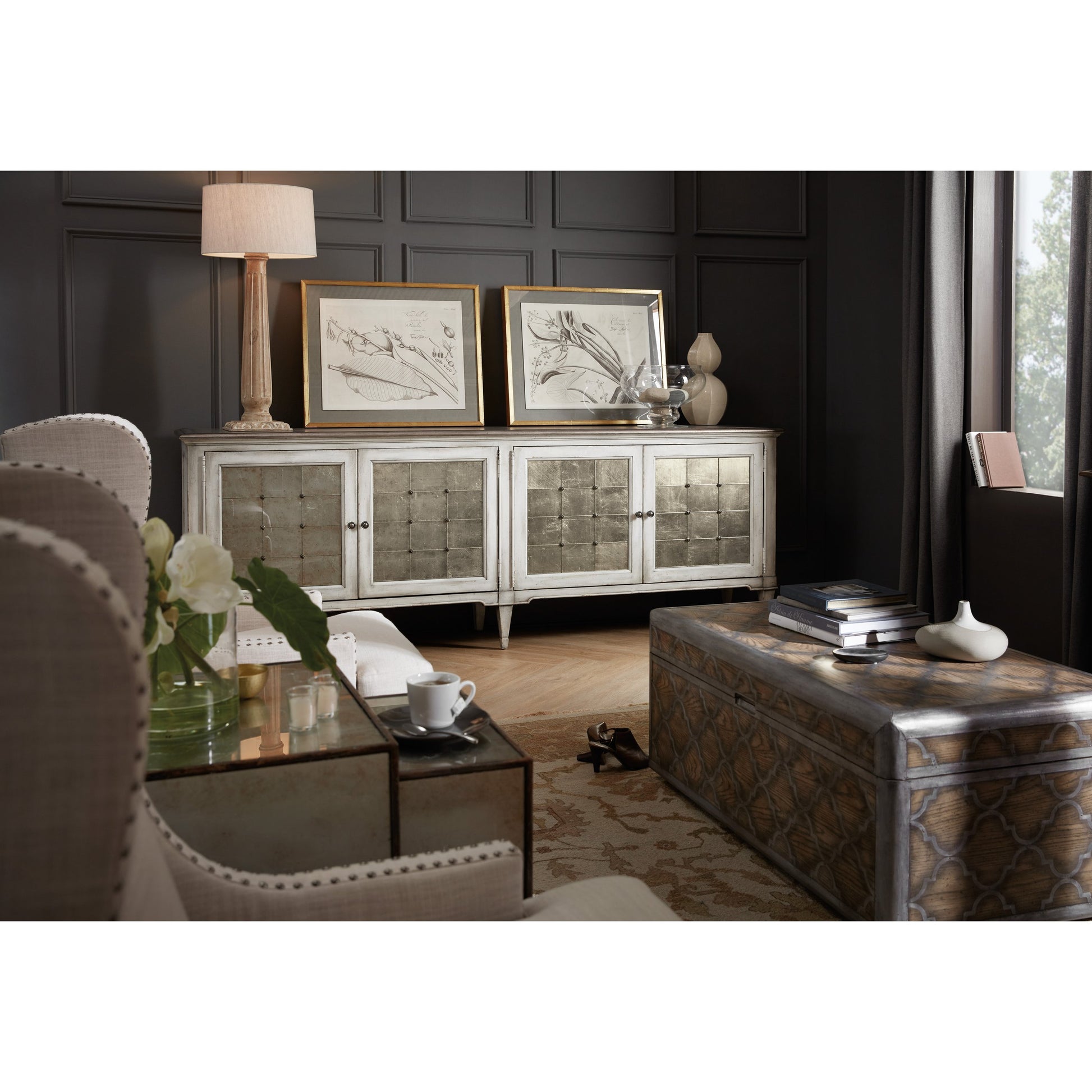 Arabella Four Door Credenza by Hooker Furniture in white. Made from maple veneers, eglomise with aluminum, metal buttons, nails in a cottage & farmhouse style.