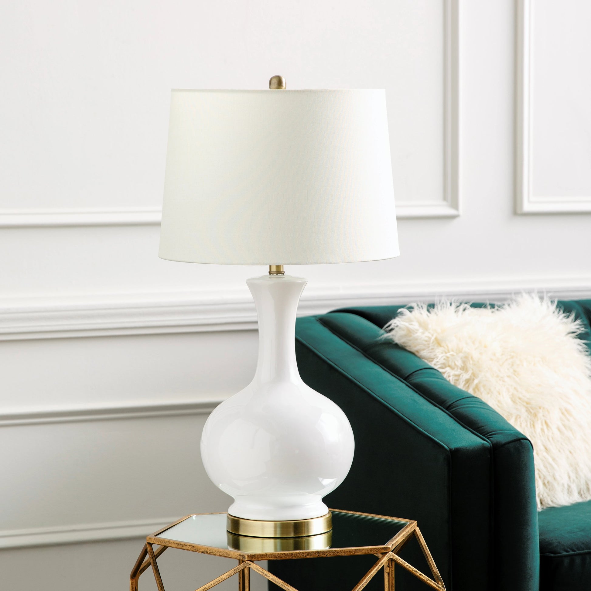 Hepburn Table Lamp - 31035 by Surya in gold, ivory, translucent, white, metallic brass and brushedglazedplated. Made from shade (outside): linen, shade (inside): polyester, body: ceramic, base: metal, finial: iron, finial: meta