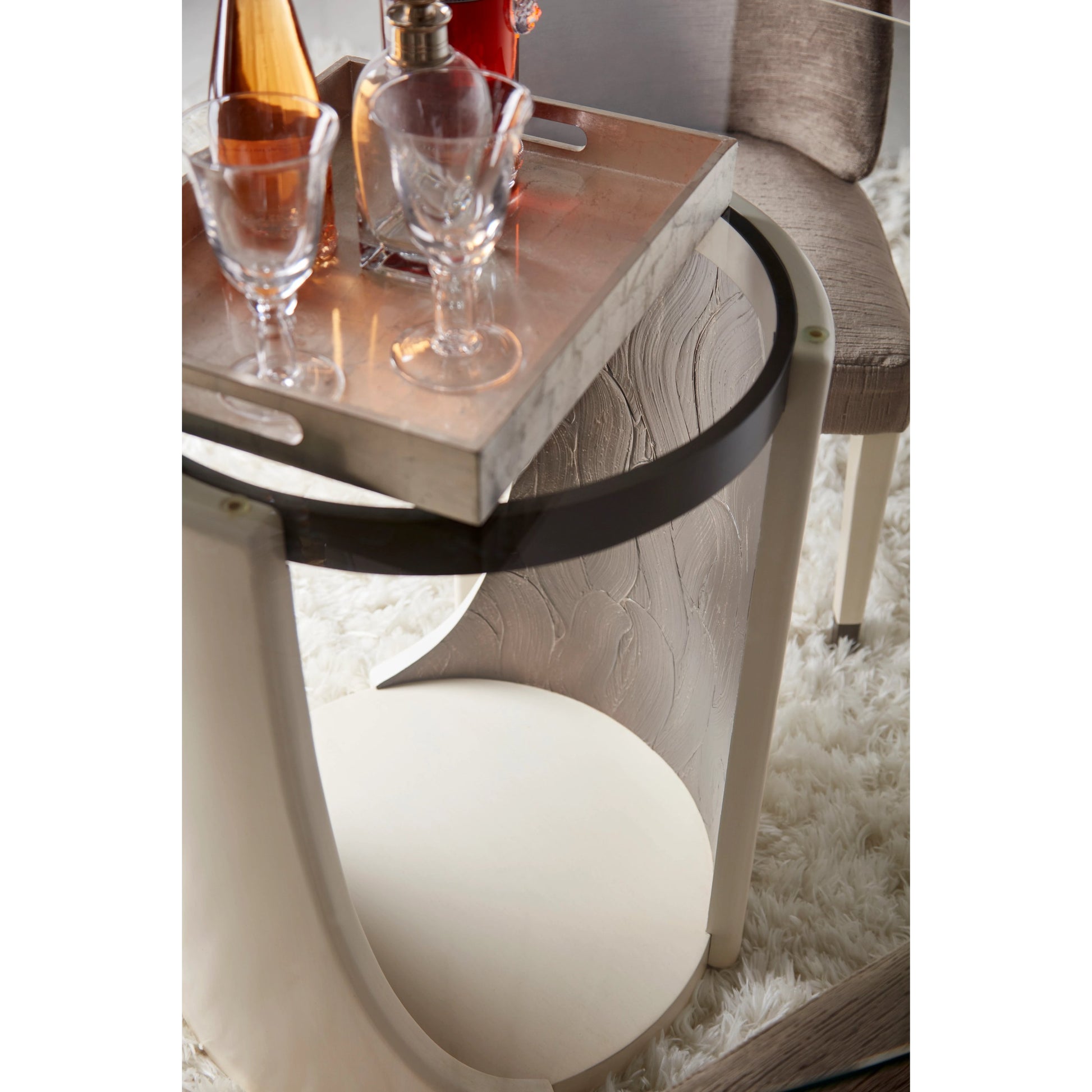 Blanc Round Dining Table by A.R.T. Furniture in alabaster, burnished bronze. Made from parawood solids, resin, metal, glass in a modern style.