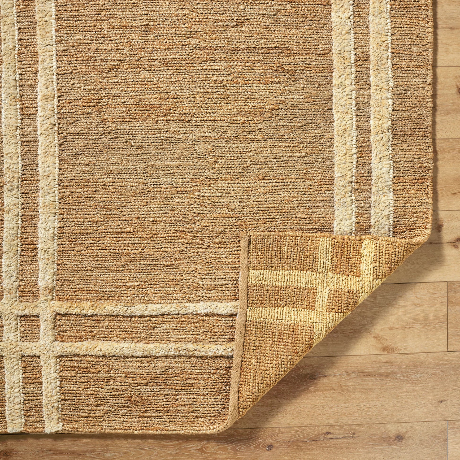 Hadley HDE-2302 Indoor/Outdoor Rug by Surya in tan. Made from main: 100% jute in a unique style.