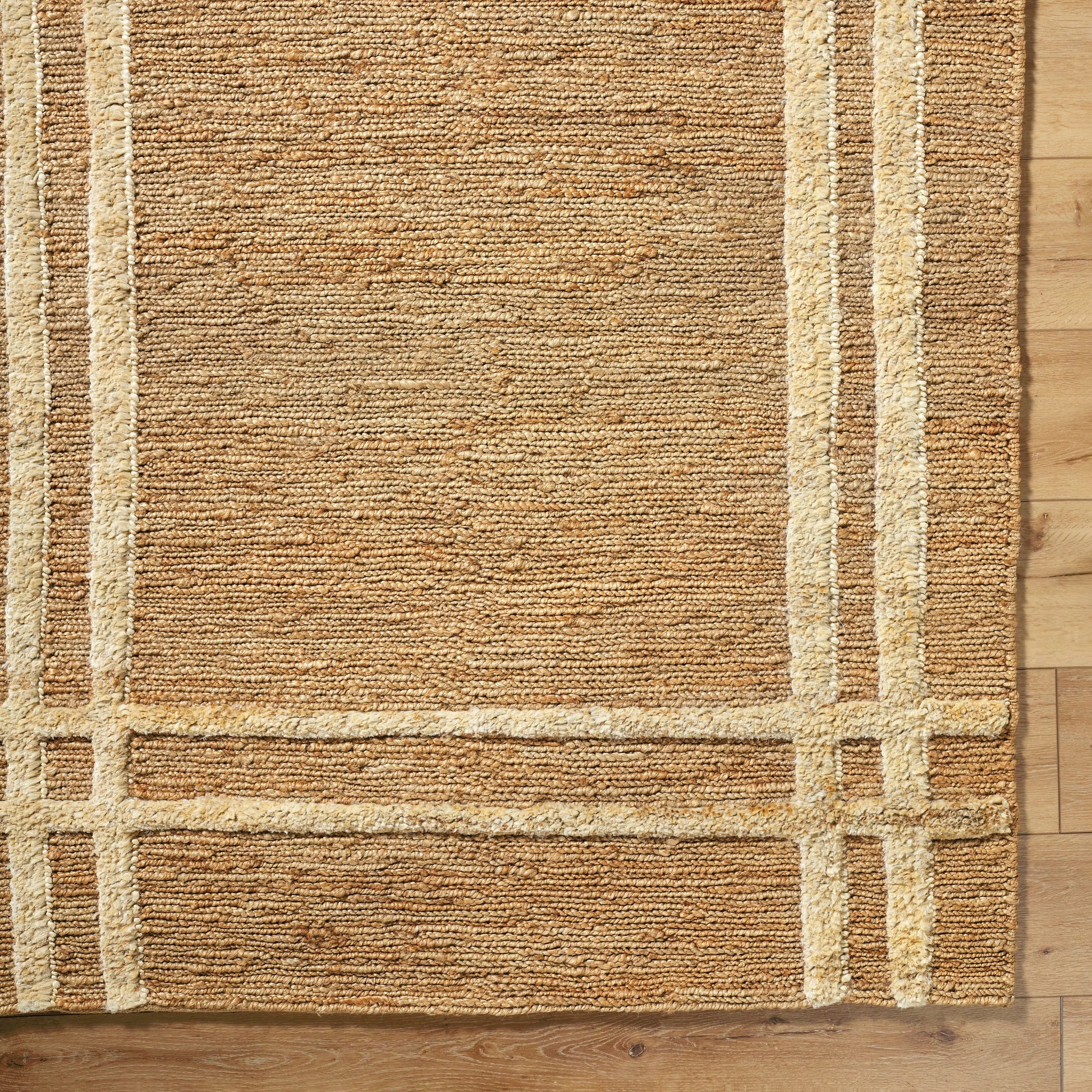 Hadley HDE-2302 Indoor/Outdoor Rug by Surya in tan. Made from main: 100% jute in a unique style.