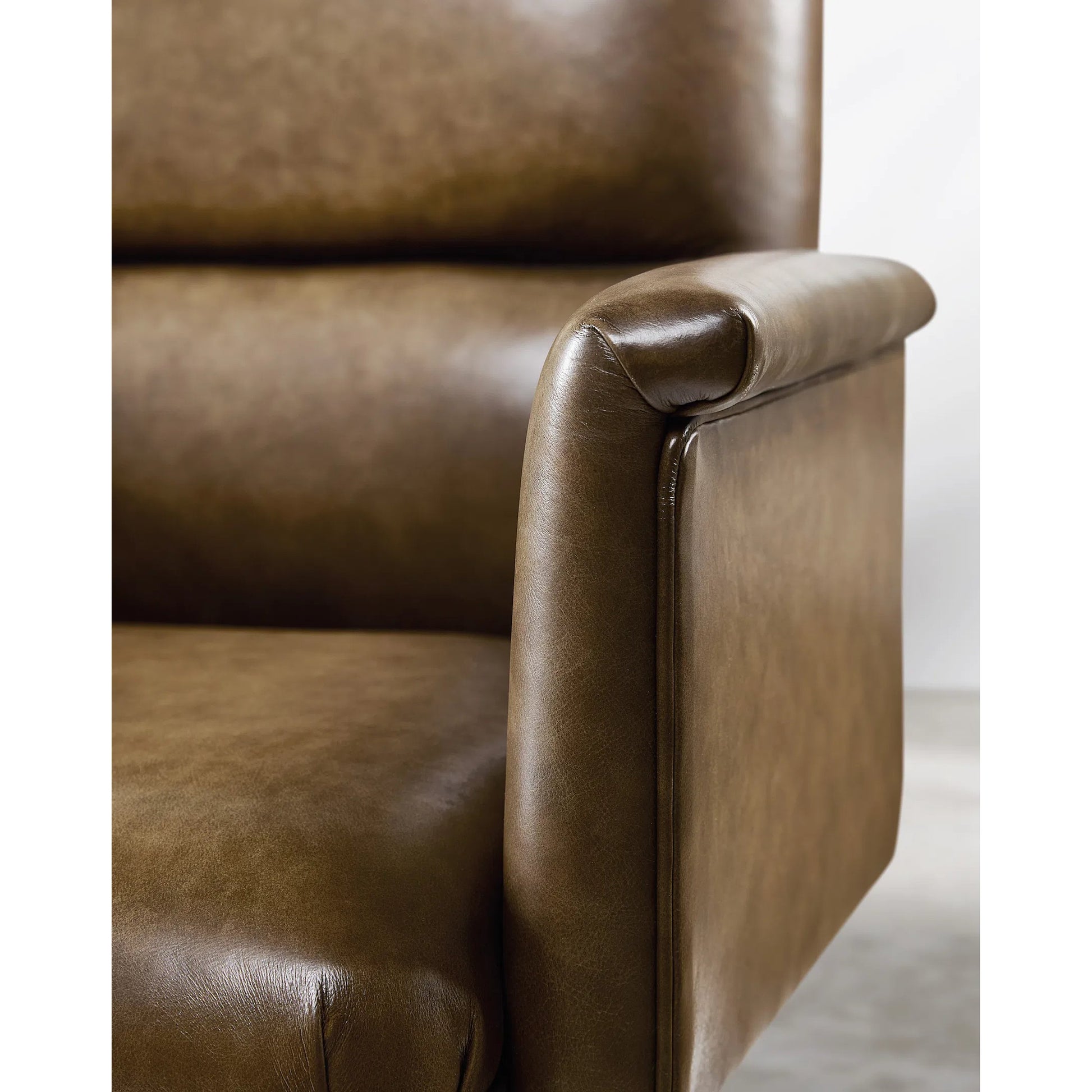 Starling Executive Swivel Tilt Chair by Hooker Furniture in nature and warm brown. Made from leather in a unique style.