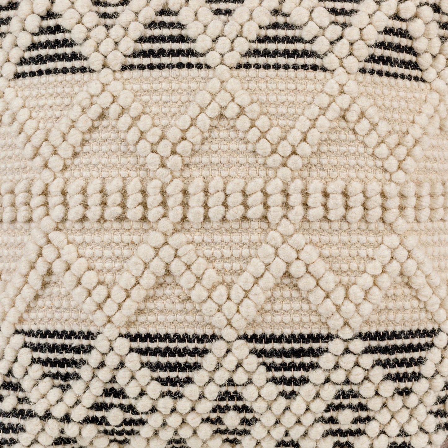 004 SI-1882684 | Closeup | Hygge - 13595 by Livabliss in black, cream. Made from 40% cotton, 30% polyester, 30% wool, 100% polybeads, 100% cotton in a eclectic & global style.