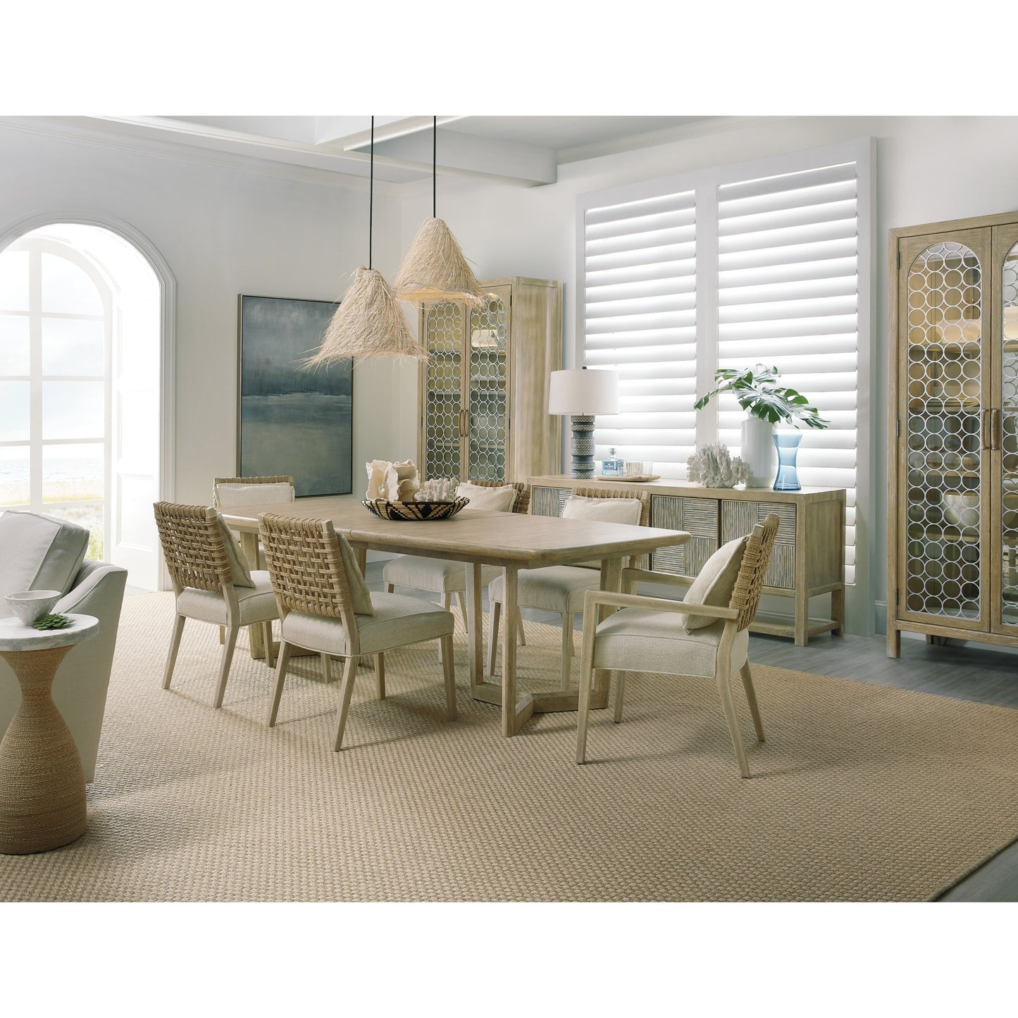 005 SI-1749838 | Lifestyle | Surfrider Display Cabinet by Hooker Furniture in driftwood. Made from pecan veneers, puck light, metal, tempered glass, rope in a coastal style.
