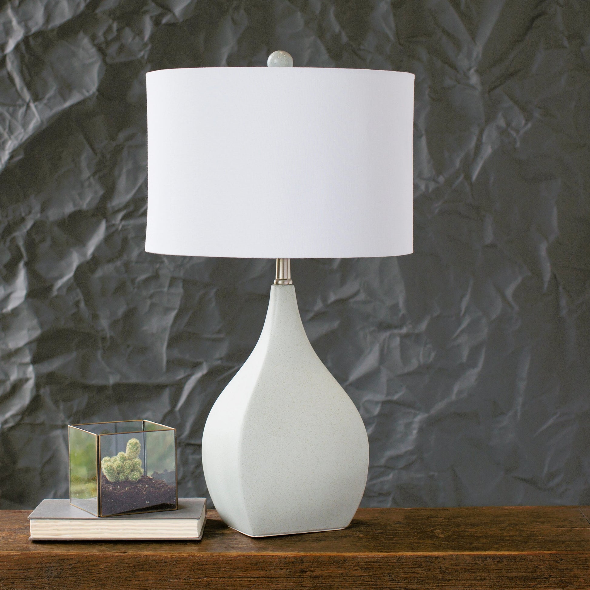 Hinton - 21526 by Surya in cream, metallic nickel, clear and glazed, light. Made from linen, polyester, ceramic, crystal, metal in a coastal style.