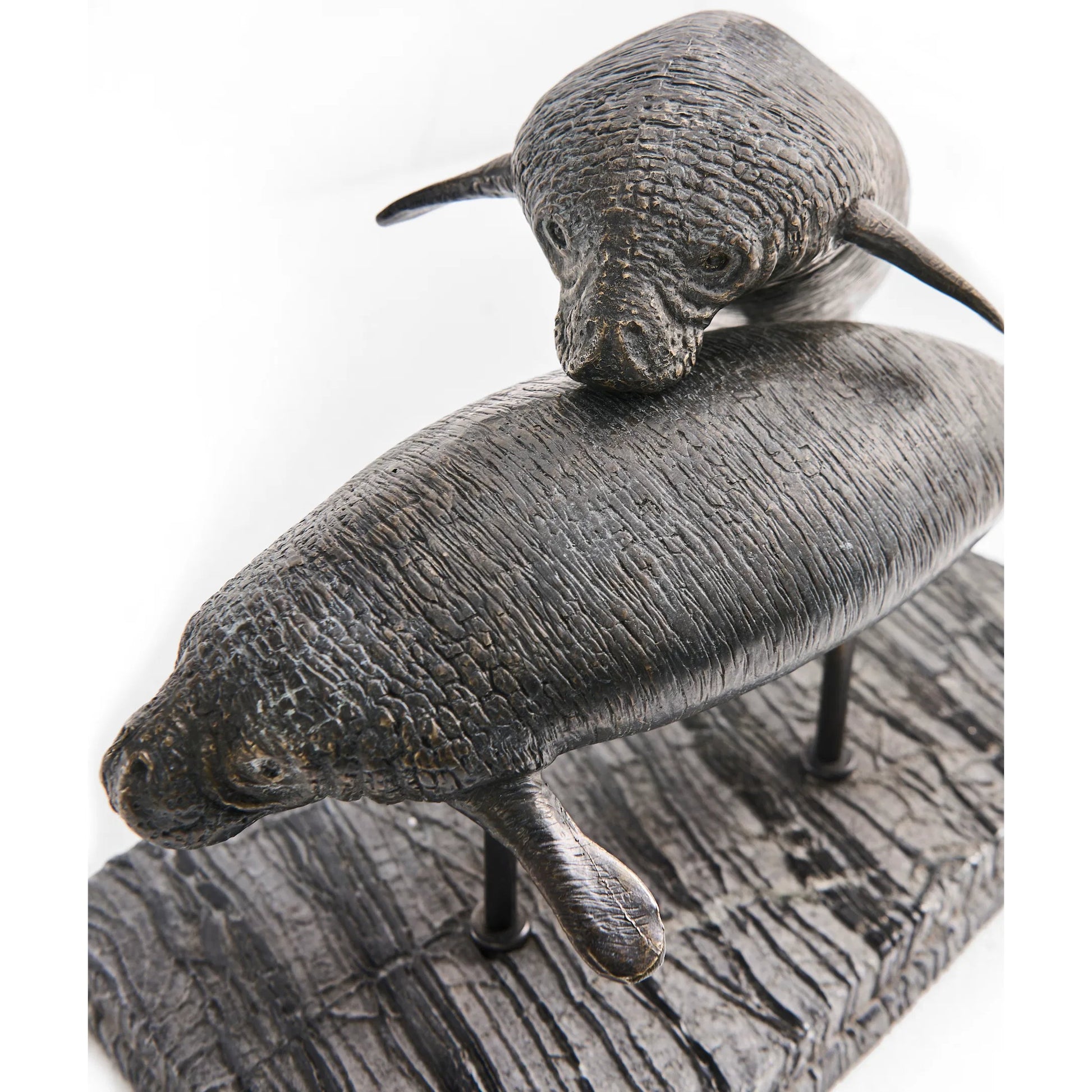 Raised Manatee Bronze Statue with Marble Base by Jonathan Charles in dark rustic waxed bronze. Made from main brass in a unique style.