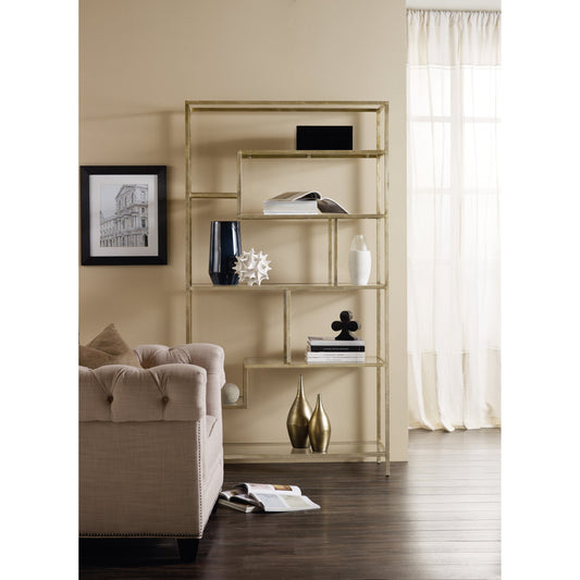 Etagere by Hooker Furniture in champagne gold. Made from iron with glass in a modern style.