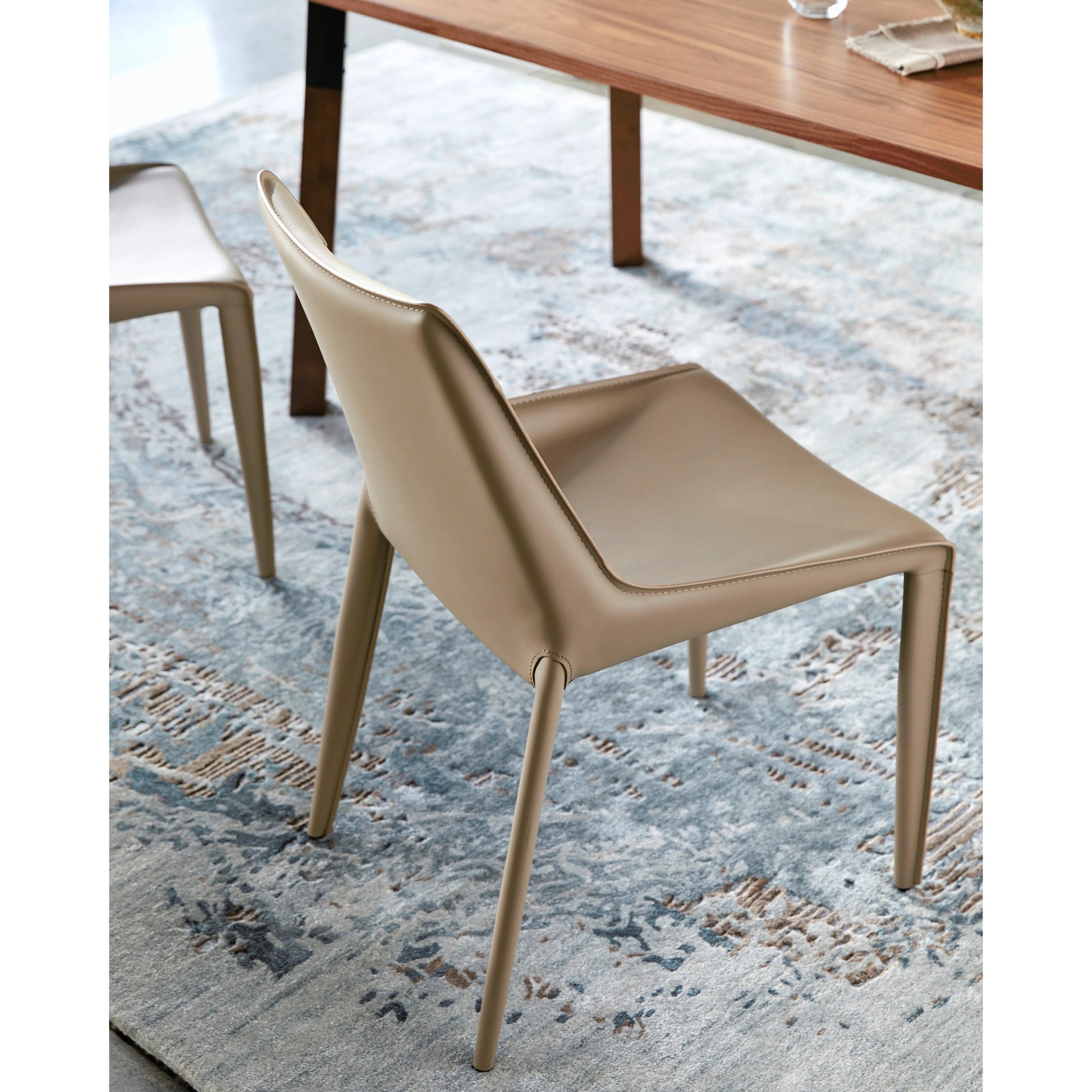Hanks Dining Chair - 497378 (Set of 2) by Surya in hand finished. Made from upholstery: pvc, base: metal, fill: 100% polyurethane foam in a modern style.