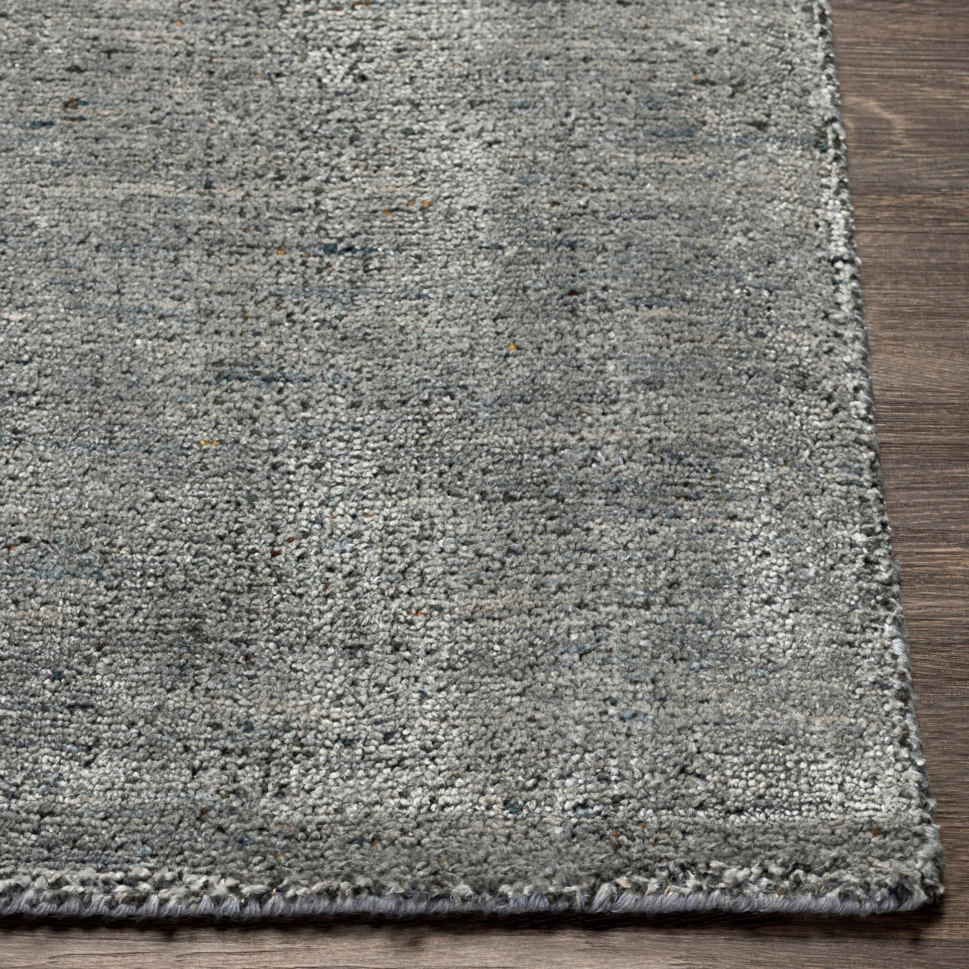 Helen HLE-2304 Rug by Surya. Made from 50% viscose, 50% wool in a unique style.